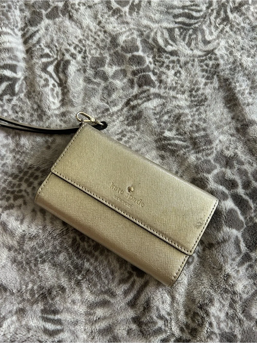 kate spade metallic gold wristlet clutch with black strap